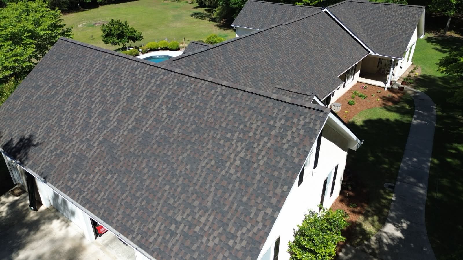 Completed charcoal architectural shingle roof on a Georgia home
